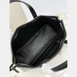 The row Polished Saddle Leather Marcel Bag